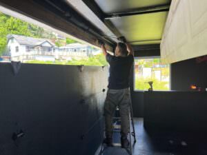 Rainbow Garage Door repairing a garage door